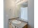 Bathroom featuring a vanity, faucet, and large mirror at 2255 Bigwood Trl, Atlanta, GA 30349