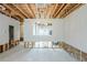 Large space with dining area and exposed beams, ready for transformation at 2255 Bigwood Trl, Atlanta, GA 30349