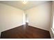 Spacious bedroom with hardwood floors, neutral walls, and ample natural light at 2522 Bear Mountain St, Lithonia, GA 30058