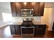 Stylish kitchen featuring stainless steel appliances and granite countertops at 2522 Bear Mountain St, Lithonia, GA 30058