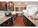 Gourmet kitchen featuring stainless steel appliances and granite countertops at 2522 Bear Mountain St, Lithonia, GA 30058