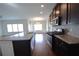 Elegant kitchen with stainless appliances and a granite island at 2522 Bear Mountain St, Lithonia, GA 30058