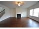 Comfortable living space with hardwood floors and a fireplace at 2522 Bear Mountain St, Lithonia, GA 30058