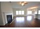 Inviting living room with fireplace and lots of natural light at 2522 Bear Mountain St, Lithonia, GA 30058