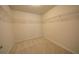 Walk-in closet featuring carpeted floors and built-in wire shelving at 2522 Bear Mountain St, Lithonia, GA 30058