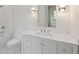 Classic bathroom features a marble vanity, modern lighting, and fixtures at 27 Maddox Ne Dr, Atlanta, GA 30309