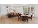 Open kitchen with a large island with seating, adjacent breakfast nook, and access to the outdoor patio at 27 Maddox Ne Dr, Atlanta, GA 30309