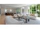 Spacious living room featuring hardwood floors and large windows allowing for an abundance of natural light at 27 Maddox Ne Dr, Atlanta, GA 30309