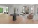 Open-concept living room featuring modern furniture, large windows, and plenty of natural light at 27 Maddox Ne Dr, Atlanta, GA 30309