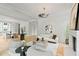 Bright, open concept living space with dining and living areas, elegant decor, and modern finishes at 27 Maddox Ne Dr, Atlanta, GA 30309