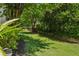 Large backyard with mature trees and landscaping at 576 Fraser Se St, Atlanta, GA 30312