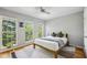 Cozy bedroom featuring many windows and hardwood floors at 576 Fraser Se St, Atlanta, GA 30312