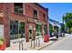 Charming storefront of Halfway Crooks bar and brewery, boasting large windows and a prime street view at 576 Fraser Se St, Atlanta, GA 30312
