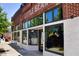 Attractive storefront of Little Bear bar, featuring an open sign and ample window displays at 576 Fraser Se St, Atlanta, GA 30312