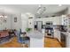Modern kitchen with stainless steel appliances, white cabinets, and granite countertops at 576 Fraser Se St, Atlanta, GA 30312