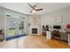 Bright living room with hardwood floors, fireplace, french doors and desk area at 576 Fraser Se St, Atlanta, GA 30312