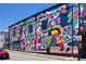 Vibrant street art mural adorns a building exterior, adding character and charm to the urban landscape at 576 Fraser Se St, Atlanta, GA 30312