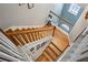 Hardwood staircase featuring wooden handrails and white banisters at 576 Fraser Se St, Atlanta, GA 30312