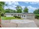 Charming one-story home with a well-manicured lawn and a two-car garage at 3125 Cardinal Lake Cir, Duluth, GA 30096