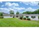 Lovely home featuring beautiful landscaping and a lush green lawn at 3125 Cardinal Lake Cir, Duluth, GA 30096