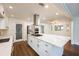 Bright, renovated kitchen with a large island, stainless steel appliances, and ample cabinet space at 3125 Cardinal Lake Cir, Duluth, GA 30096