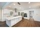 Modern kitchen with stainless steel appliances and a large center island at 3125 Cardinal Lake Cir, Duluth, GA 30096