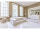 Luxurious bathroom featuring a jacuzzi tub, large windows, and marble floors at 3450 Ridgewood Nw Rd, Atlanta, GA 30327
