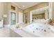 Spacious bathroom with a jacuzzi tub, tiled floors, and a glass shower at 3450 Ridgewood Nw Rd, Atlanta, GA 30327