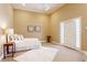 Serene bedroom with high ceilings, neutral tones, and a plush rug creating a cozy retreat at 3450 Ridgewood Nw Rd, Atlanta, GA 30327