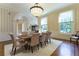 Bright dining room featuring a light fixture and striped walls at 3450 Ridgewood Nw Rd, Atlanta, GA 30327