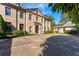 View of the front of the home and circular driveway showing architectural features and landscaping at 3450 Ridgewood Nw Rd, Atlanta, GA 30327