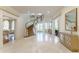 Spacious foyer featuring a curved staircase and elegant decor at 3450 Ridgewood Nw Rd, Atlanta, GA 30327