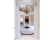 Foyer with columns and marble floors, detailed with a striking star design at 3450 Ridgewood Nw Rd, Atlanta, GA 30327