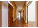 Elegant hallway with hardwood floors, decorative walls, and bright lighting at 3450 Ridgewood Nw Rd, Atlanta, GA 30327