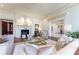 Spacious living room featuring a fireplace, hardwood floors, and elegant decor at 3450 Ridgewood Nw Rd, Atlanta, GA 30327