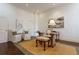 Office space featuring a glass desk, decorative lamp, and two matching chairs with bright light at 3450 Ridgewood Nw Rd, Atlanta, GA 30327