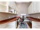 Well-lit office space with custom built-ins, sleek desk, and ample storage space at 3450 Ridgewood Nw Rd, Atlanta, GA 30327