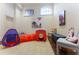 Playroom filled with toys and art on walls and hardwood floors at 3450 Ridgewood Nw Rd, Atlanta, GA 30327