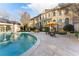 Exterior view of the pool, sun loungers and pool house at the back of the home at 3450 Ridgewood Nw Rd, Atlanta, GA 30327