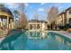 Back view of the pool, cabana, and gazebo, perfect for relaxing and entertaining at 3450 Ridgewood Nw Rd, Atlanta, GA 30327
