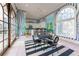 Pool house bar with white cabinetry and nearby seating area at 3450 Ridgewood Nw Rd, Atlanta, GA 30327