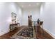 Bright sitting room with a table, chairs, and space for a wine rack at 3450 Ridgewood Nw Rd, Atlanta, GA 30327