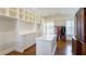 Open walk-in closet with shelves, drawers, and hanging racks for clothing and accessories with a center island at 3450 Ridgewood Nw Rd, Atlanta, GA 30327
