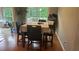 Casual dining area offers backyard views, light wood floors, and seating for four at 585 Station View Run, Lawrenceville, GA 30043