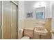 Vintage bathroom with tiled shower, sink, and fixtures at 2175 Fisher Ne Trl, Atlanta, GA 30345