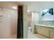 Updated downstairs bathroom with patterned tile, shower, and vanity with under cabinet storage at 2175 Fisher Ne Trl, Atlanta, GA 30345