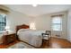 Well-lit bedroom featuring wood floors, natural light, and neutral walls at 2175 Fisher Ne Trl, Atlanta, GA 30345