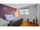 Cozy bedroom features hardwood floors, natural light, and stylish decor at 2175 Fisher Ne Trl, Atlanta, GA 30345