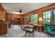 Comfortable living room features natural light, wood paneling, and cozy seating at 2175 Fisher Ne Trl, Atlanta, GA 30345