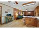 Open-concept living room features wood floors, wood paneling, and natural light at 2175 Fisher Ne Trl, Atlanta, GA 30345